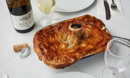 A guineafowl and trotter pie with the bone-marrow funnel.