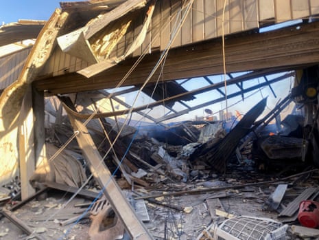 A view shows a damaged site after what Syrian state news agency said was an Israeli strike in Damascus suburb of Mazzeh.