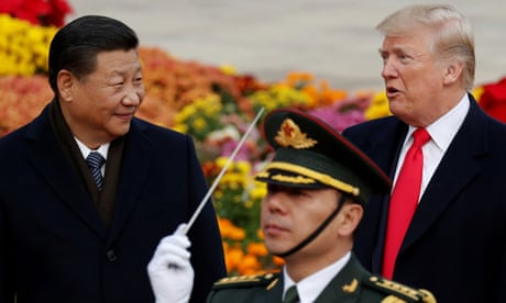 FILE PHOTO: U.S. President Donald Trump takes part in a welcoming ceremony with China’s President Xi Jinping at the Great Hall of the People in Beijing, China, November 9, 2017. REUTERS/Damir Sagolj/File Photo