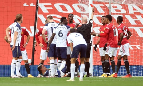 Anthony Martial is shown a red card after lashing out at Erik Lamela