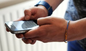 An iPhone 4s, the first model to ship with iMessage functionality.