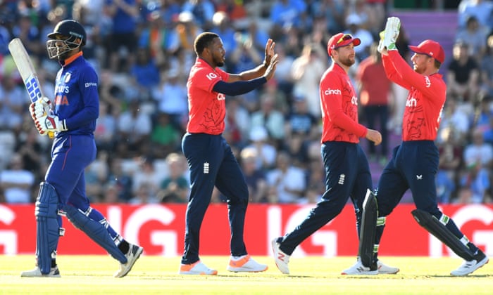 England’s Chris Jordan (centre) celebrates the wicket of India’s Deepak Hooda (left) with team-mates.