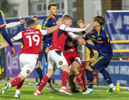 Andy Cannon and Max Dowman scuffle after the latterâÂÂs retaliation to a challenge