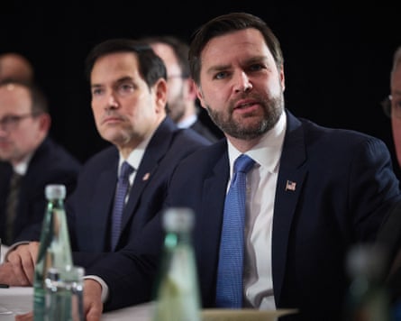 Vance and Rubio sit side by side at a table