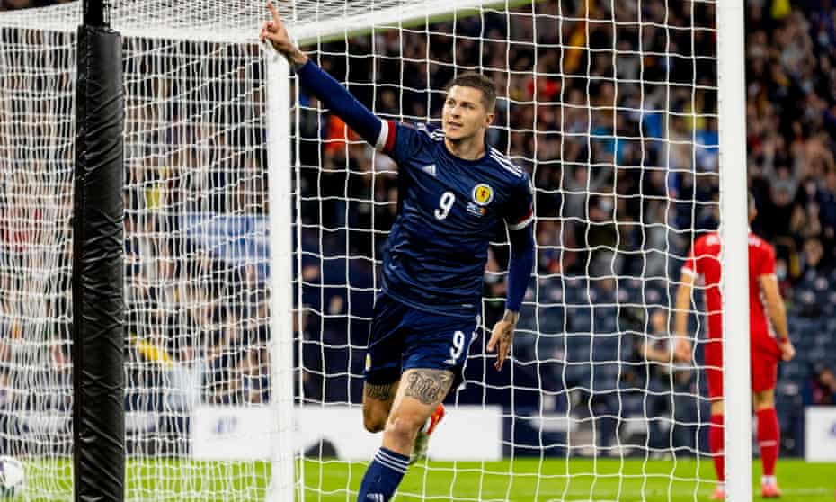 Lyndon Dykes celebrates after putting Scotland in front