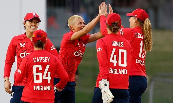 England’s Issy Wong (centre) is congratulated by her team-mates after taking the wicket of South Africa’s Lara Goodall.