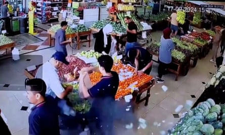 CCTV screengrab of a pager apparently exploding in a market in Lebanon.