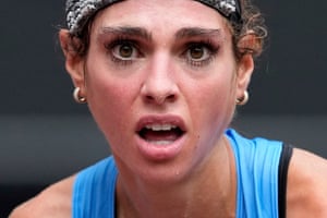 Julia Paternain of Uruguay reacts with disbelief after crossing the finish line to win bronze in the women’s marathon.