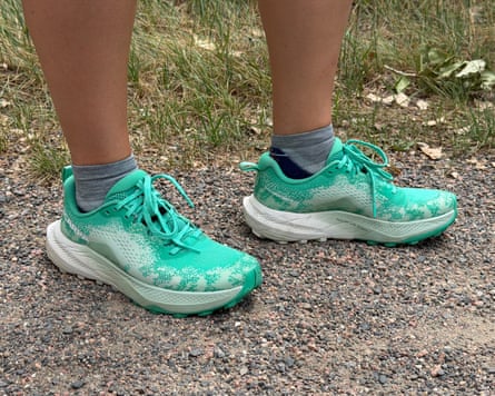 A person standing on a path in Scarpa shoes