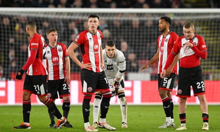 Sheffield United players mill around aimlessly after Arsenal’s fourth, scored by Kai Havertz