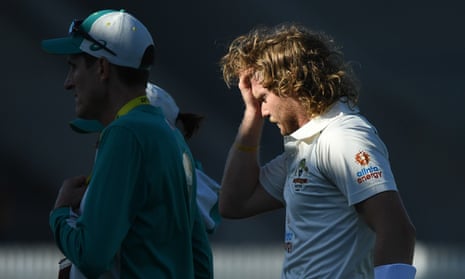 Will Pucovski leaves the field after being hit on the helmet in a match between Australia A and India A in 2020.