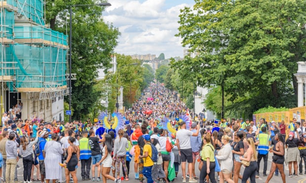 Part of the huge Notting Hill carnival crowd as seen from Ladbroke Grove in west London