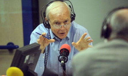 Humphrys prepares to grill an interview subject in the radio studio.