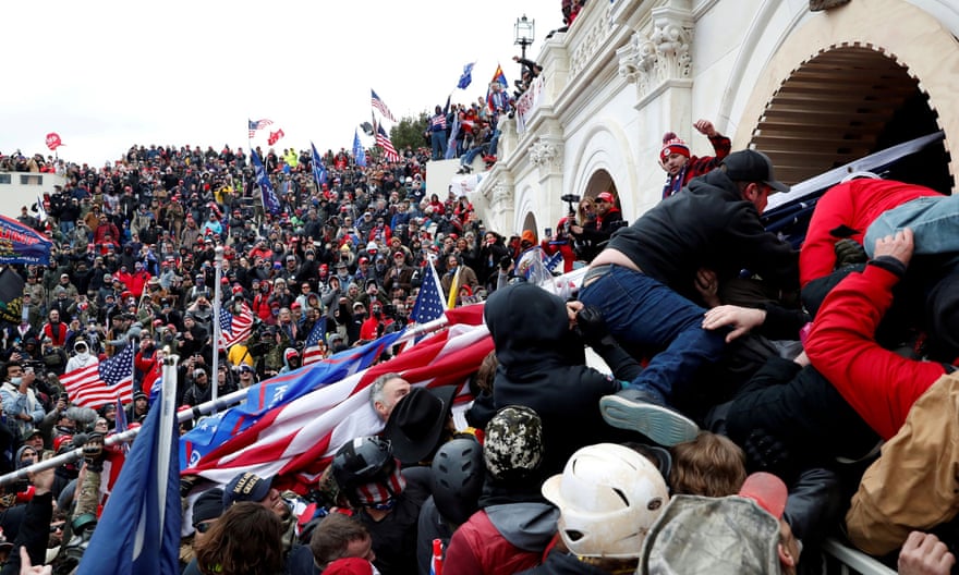 Pro-Trump rioters storm into the US Capitol on 6 January.