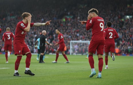 Roberto Firmino and Harvey Elliott celebrate the opener at Anfield.