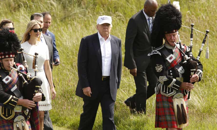 Donald Trump arrives to the sound of bagpipes.