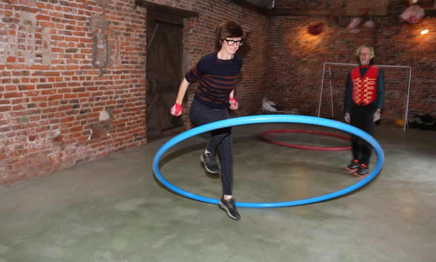 Emma Beddington tries … the Cyr wheel: ‘I’m about as supple as an ironing board’ 1 Hoop dreams … Beddington manages to jump into the ring.