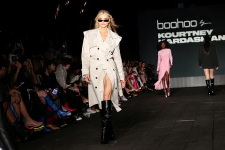 Models present creations by Boohoo X/ Kourtney Kardashian at the High Line during New York Fashion Week in Manhattan, New York City, 2022.