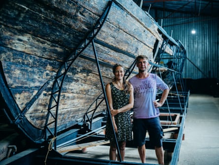 Dzneladze and Denysenko stand beside a large ship at the Chaika Maritime Museum on Khortytsia island.