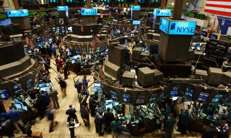 Traders work on the floor of the New York Stock Exchange in 2008