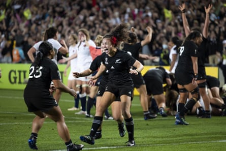 Ruby Tui and other New Zealand players jumping and screaming with joy and going to hug each other