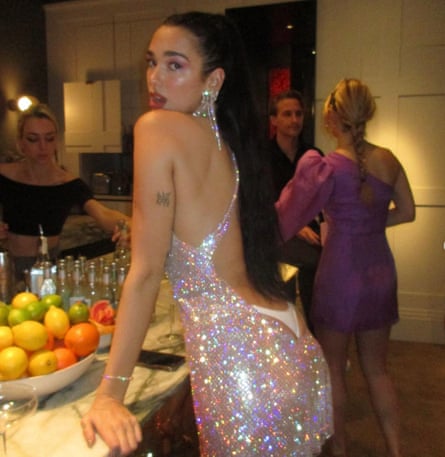 At new year, Dua Lipa wore a dress cut so low at the back that it exposed her thong knickers.