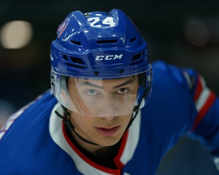 Hudson Williams as ice hockey star Shane Hollander.