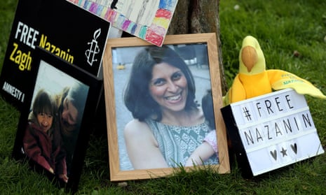 A photo of Nazanin Zaghari-Ratcliffe with messages of protest in London