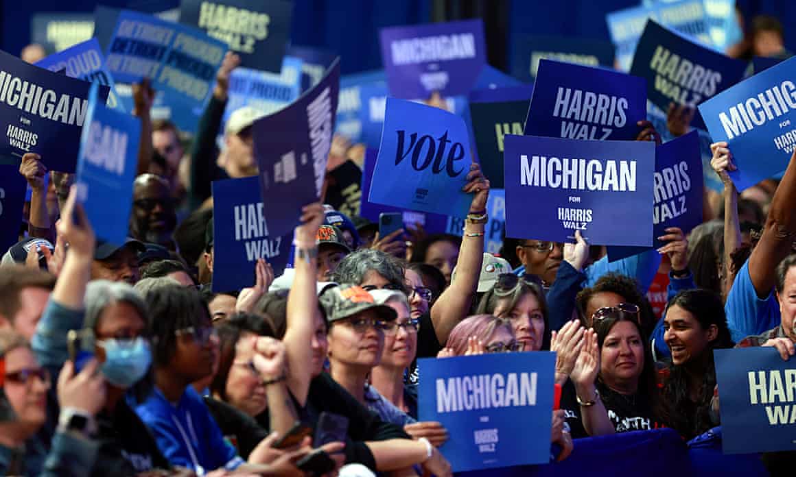 Voters attend a Kamala Harris and Tim Walz campaign rally in Michigan.