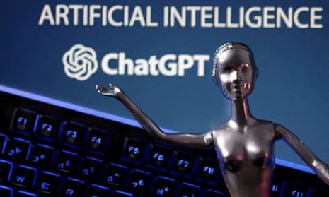 silvery female figurine in front of a laptop displaying the chatgpt logo
