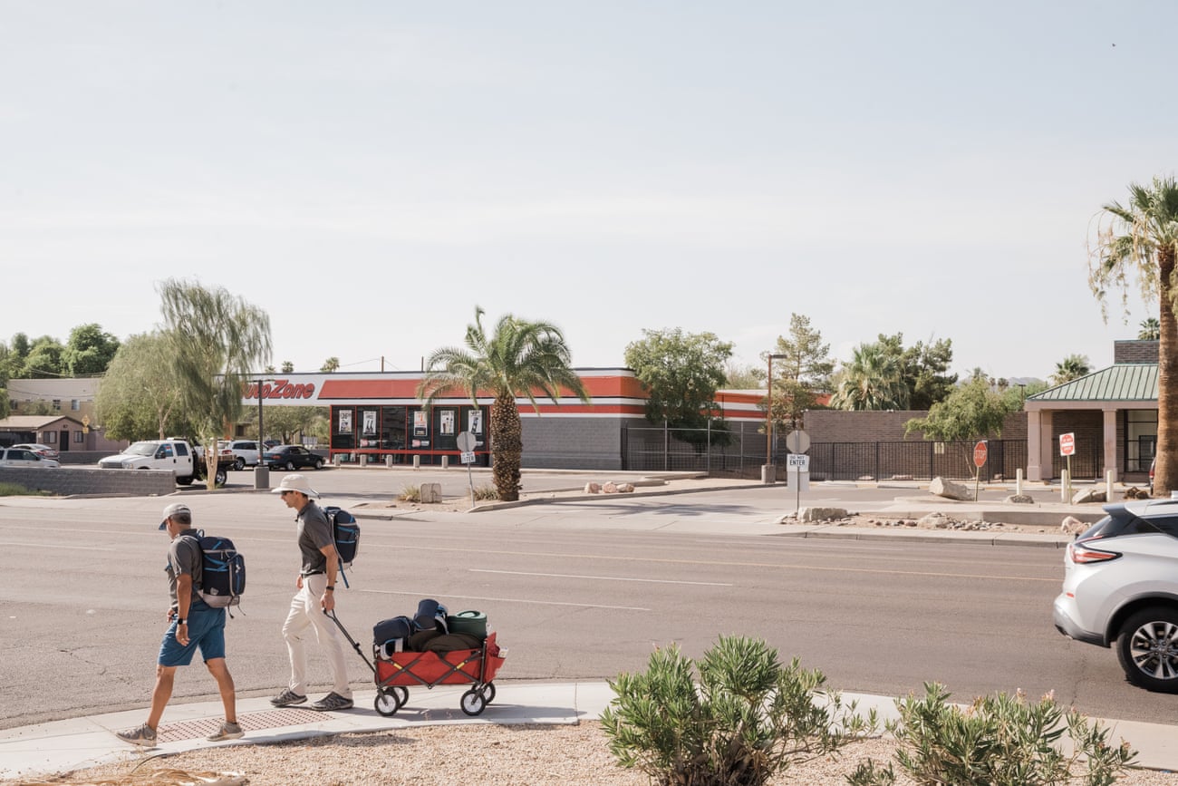 Dr David Hondula walks with volunteer Ray Miller during a shift of outreach.
