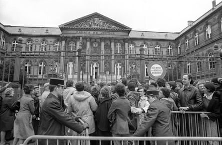 A country transfixed … the crowd outside the court.