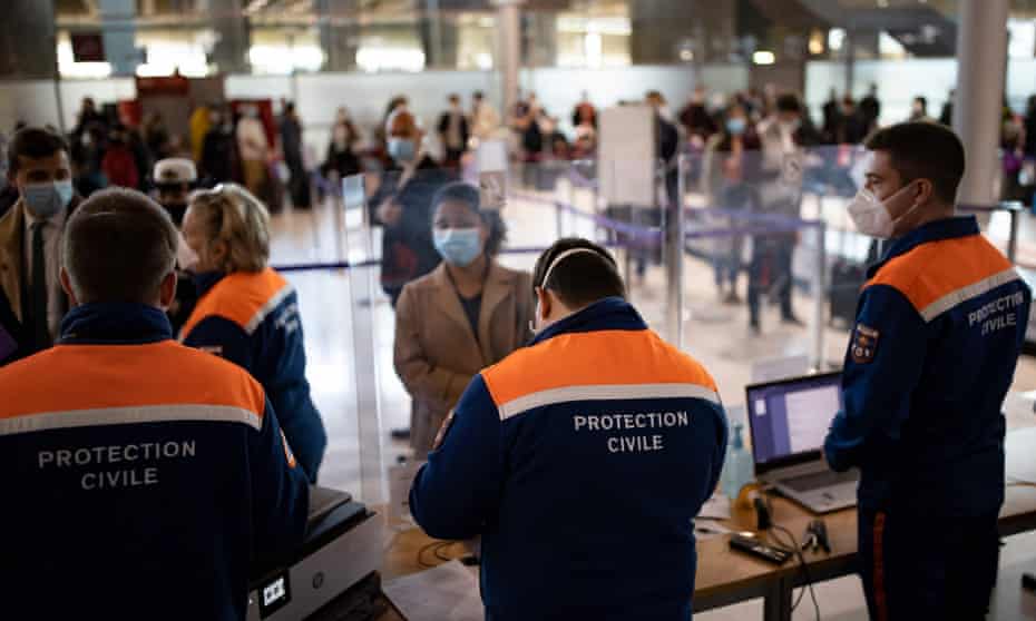 Passengers arriving at Roissy Charles de Gaulle airport near Paris in April register for Covid tests