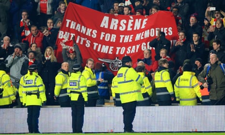 Arsenal fans hold up a banner calling for Arsène Wenger to be sacked during the FA Cup fifth round replay at Hull