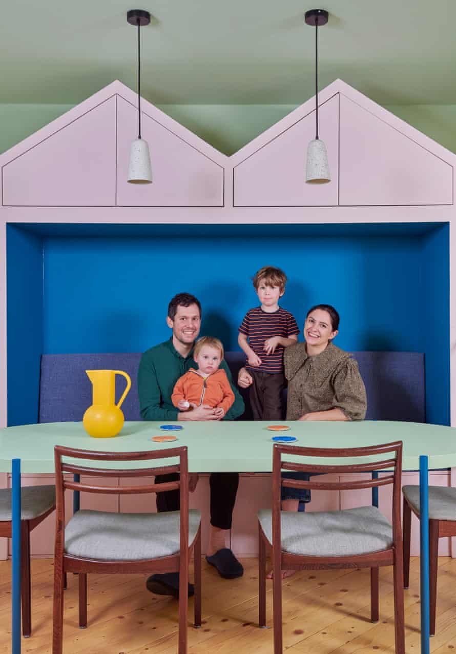 Tamsin Chislett, partner Max Lines and children Mo and Marcie Chislett in their brightly coloured kitchen