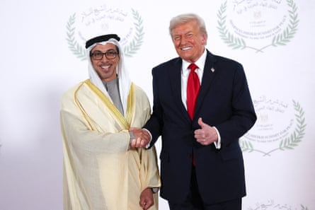 Trump and Mansour bin Zayed shaking hands