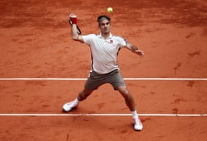 Roger Federer focusses on the ball as he readies a return.
