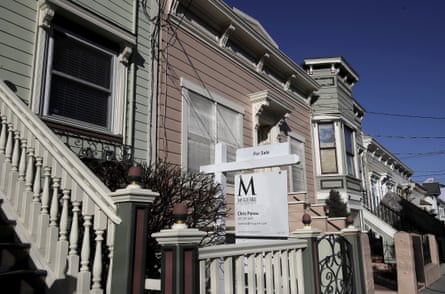 A real estate sign is shown in front of a home for sale in San Francisco.
