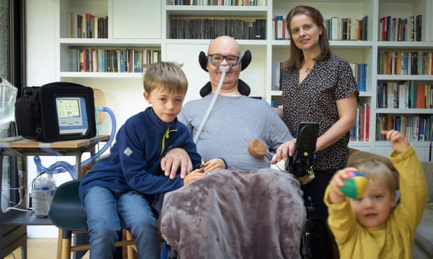 Joe Hammond with his wife, Gill, and sons Tom (left) and Jimmy, at home, November 2019