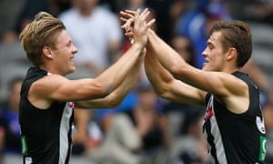Jordan De Goey (left) and Darcy Moore are among a host of talented young Pies who should put the club in Premiership contention over the next half-decade.