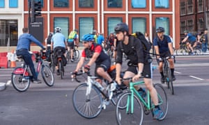 Cyclists on a cycle superhighway near Blackfriars Bridge, London