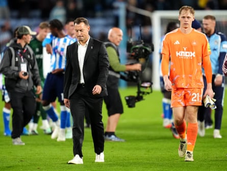 Newcastle United manager Matthias Jaissle (left) and goalkeeper Lukas Hornicek look dejected after their Premier League defeat at Coventry