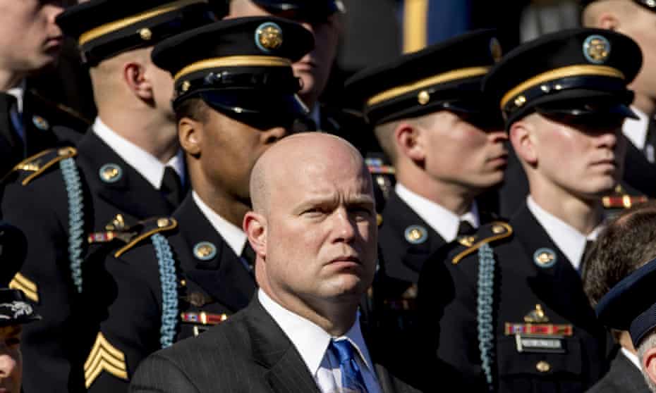 Acting attorney general Matt Whitaker, center, attends a wreath laying ceremony at Arlington National Cemetery on Veterans Day.