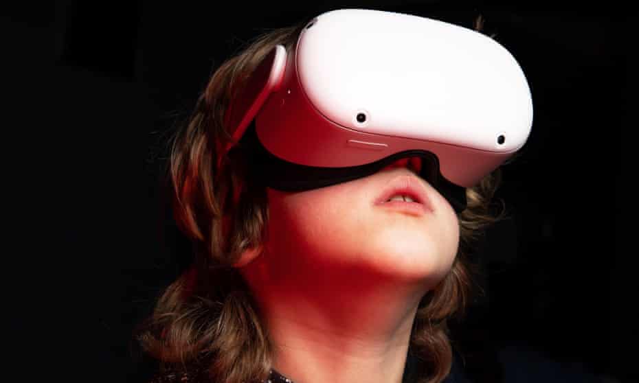 Child wearing a VR head set.