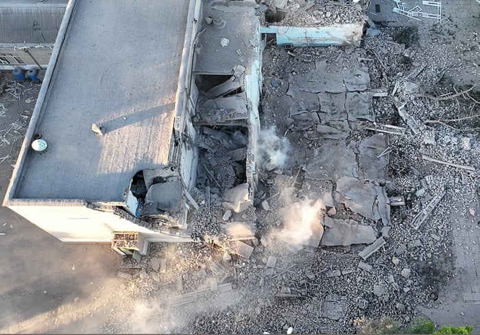 An aerial view shows a school building destroyed by a Russian military strike, 14 July.