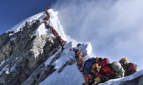 A long queue of mountain climbers heading for the summit of Mount Everest