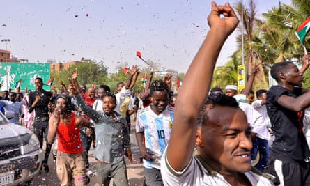 Demonstrators in Khartoum celebrate Bashir’s departure on Thursday.