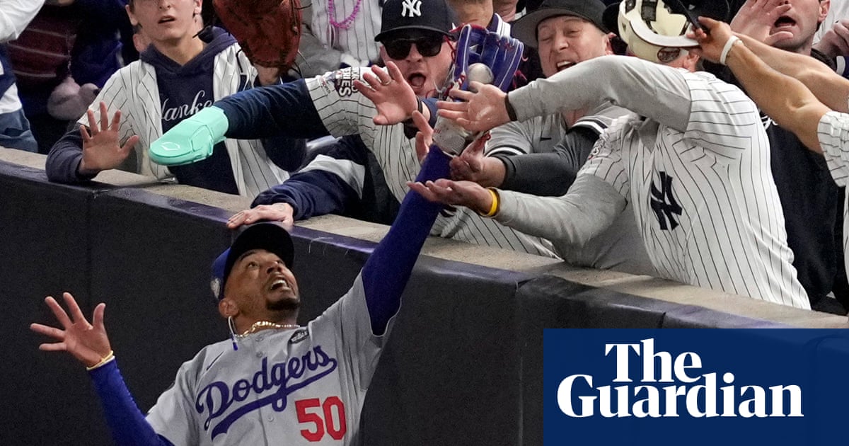 MLB bans Yankee fans who interfered with Betts at World Series indefinitely MLB bans Yankee fans who interfered with Betts at World Series indefinitely