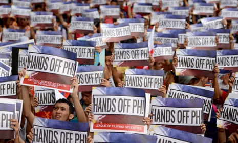 Activists in front of the Chinese consular office in Manila in June shouting slogans against China’s reclamation and construction activities on islands and reefs in the Spratly Group of the South China Sea that are also claimed by the Philippines. 