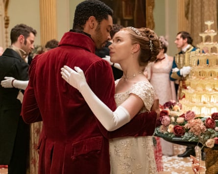 Two people in Regency dress, dancing and gazing intently at each other